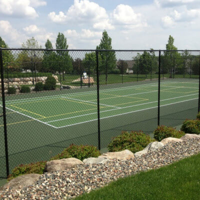 Private tennis court green with pickleball lines
